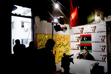 A man broadcasts from the television studio at the rebels' headquarters in Benghazi. Benghazi is now in the hands of the rebels. On 17 February 2011 Libya saw the beginnings of a revolution against th...