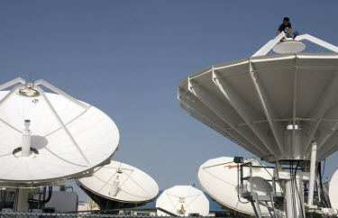 Satellite dishes on the roof at news channel Al Jazeera in Doha.