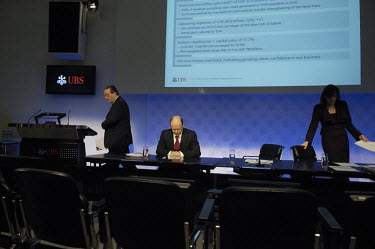 A press conference to announce the annual results of UBS, Switzerland's largest bank, in an auditorium in the bank's complex of buildings in the centre of Zurich. At left is Oswald Grubel, Group CEO o...