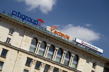 Advertising signs for Citigroup, Actavis and Unicredit Bulbank on a roof top overlooking Sofia.