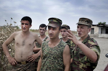 A group of soldiers belonging to the armed forces of Nagorno-Karabakh at a border post with Azerbaijan. The Nagorno-Karabakh Republic (NKR) is a de facto independent republic which is not recognized i...
