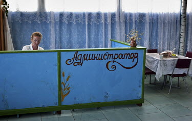 The cashier at canteen restaurant in the Black Sea resort town of Zatoka, a cheap summer destination in Ukraine, very popular among Moldovians tourists.