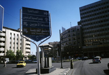 A road sign in central Damascus points the way to Old Damascus in Arabic and English.