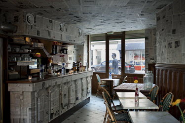 The 11 Avril bar in Trouville. The bar is decorated with pages from the Le Monde newspapers. The owners of the bar organise the 'Off Courts' short film festival that runs at the same time as the large...