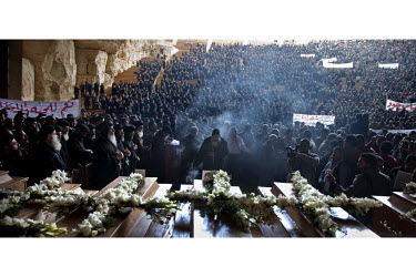 A Coptic Christian mass funeral at St Simon the Tanner's Church in Mokattam, Cairo. The funeral is for 11 young protesters who were killed by the army during a protest against the burning of a church...