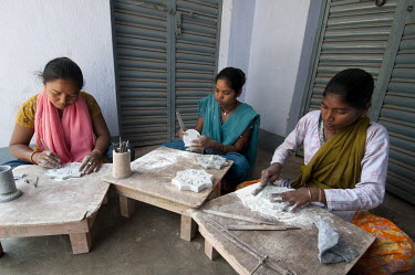 Girls from the Ho tribal group have been trained in soap stone carving. A cottage industry iniatative by TCS (Tribal Culture Society of Tata Steel). During their training period they are paid 100 rupe...