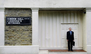 David Hammond poses at the Jehovah's Witness Kingdom Hall in Skipton, North Yorkshire.