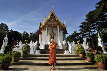 Phramaha Sangthong Dhammacaro poses at Buddhapadipa Temple in Wimbledon, London.