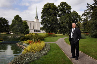President Michael Fagg poses outside the Mormon Temple in Lingfield, Surrey.