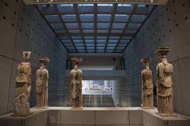 Five of the original six late 5th century BCE Caryatid sculptures that propped up part of the ancient Erechtheion Temple on the Acropolis are displayed in the new Acropolis Museum. The sixth is in the...