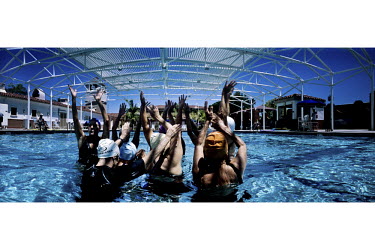The Aquadettes practice a routine in a swimming pool at Laguna Woods, California. The Aquadettes are a group of women ageing from their early 60s upwards who meet to practice synchronised swimming. Ev...