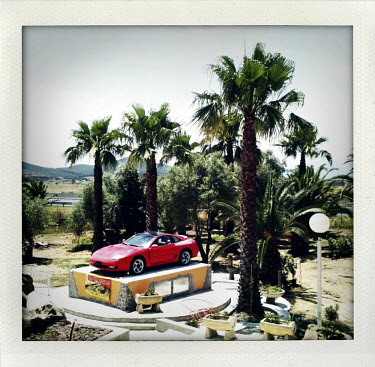 A Ferrari car on show near the highway S131, Sardinia.