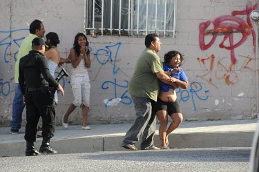 Family of a person killed in the notorious Bella Vista Neighbourhood grieve on the street.Ciudad Juarez, has been plagued by drug violence. With over 3000 people killed in 2010, the city had officiall...