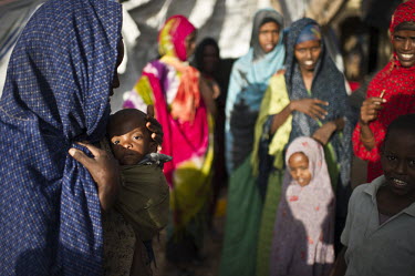 Women wait for milk and medication for their malnourished children in Galcayo hospital. Galcayo is a town in the self-declared autonomous state of Puntland. The populace in the region suffers from a l...