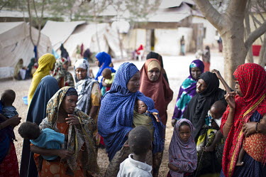 Women wait for milk and medication for their malnourished children in Galcayo hospital. Galcayo is a town in the self-declared autonomous state of Puntland. The populace in the region suffers from a l...