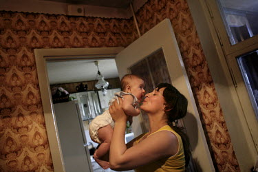 25 year old doctor Ala Roguti with her daughter Tanja in their apartment in Tiraspol, Transnistria. Also known as Trans-Dniestr or Transdniestria, Transnistria, located mostly on a strip of land betwe...