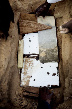 A grave is prepared for a child who died as a result of malnutrition at a Medecins Sans Frontieres (MSF) centre for severely malnourished children. More than 80 children have died in this part of the...