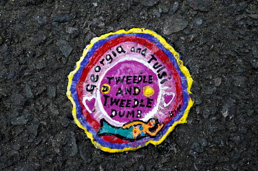 One of artist Ben Wilson's unique minitures using squashed chewing gum as a canvas. He has been producing these paintings on the pavements of London for over five years. The pictured piece is in Muswe...