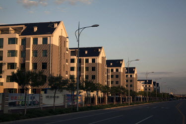 Empty apartments on an empty street in Ordos. The Kangbashi District of Ordos, a district planned, five years ago, for 1 million inhabitants, still lies almost dormant and has become known as a 'Moder...