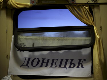 A sign reads Donetsk on the night train from Simferopol to Donetsk.
