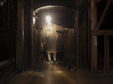 A lift lands in a flooded gallery in the Navagrodovskaya coal mine, West Donetsk.