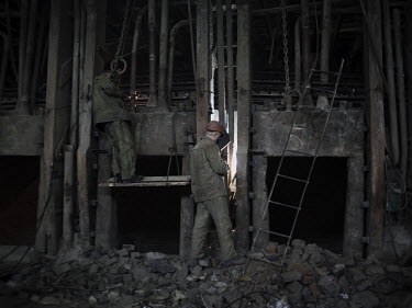 Workers carry out repairs at the Donetsk steel plant.