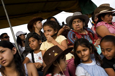 Spectators watch the events during the annual Rodeo Montubio. Every year a rodeo is organized to celebrate the cowboys of Ecuador.