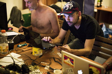 Indignes use computers at their media centre in Paris. The Indignant movement (Indignes, los Indignados) calls for social justice and change in it's respective countries.
