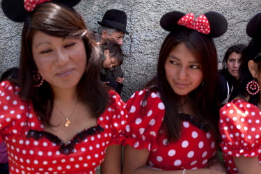 Girls dress up like Minnie Mouse for Carnival in Guanujo, near Guaranda.