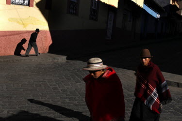 People walk the streets of Guaranda.