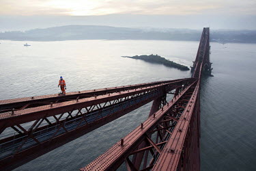 Abseiler William Waddall, 32, the 125 year old Forth Rail Bridge which spans the river Forth near Edinburgh. Network Rail, the operator of the rail track that leads over the bridge, has spent 10 years...