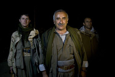 PKK leader Murat Karayilan stands for portrait with other guerillas. Labelled as terrorists by the Turkish, US and EU, it's in the Qandil Mountains near the border where the guerrillas of the PKK (Kur...