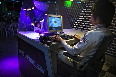 A player inside a game station competes against his opponent during a live online gaming tournament in Seoul.