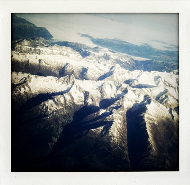 The Italian Alps seen from a passenger plane.