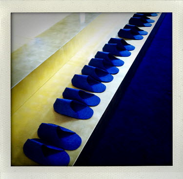 Footware for visitors to an exhibition by Belgian artist Jan Fabre at the Nuova Scuola Grande di Santa Maria della Misericordia during the 54th International Art Exhibition titled ILLUMInazioni.