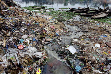 Rubbish chokes the Buriganga River. Everyday 1.5 million cubic metres of waste water from 7,000 industrial units in surrounding areas and another 0.5 million cubic metres from other sources are releas...