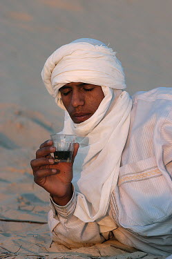 Bedouins drinking tea in the Sahara Desert.
