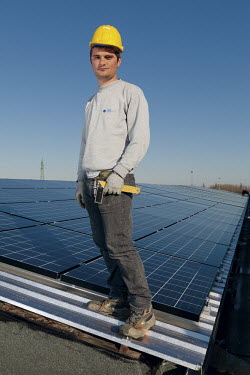 An Albanian migrant who lives in the small town of Faenza and works installing solar energy panels.
