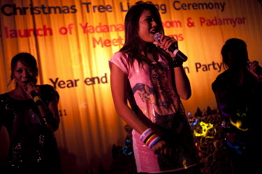 The 'Me N Ma Girls', Myanmar's first girl band, perform on stage at a private function in a hotel in Yangon. The band's members were recruited by Australian dancer Nicole May. They sing and dance in t...