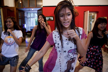 The 'Me N Ma Girls', Myanmar's first girl band, rehearse their act. The band's members were recruited by Australian dancer Nicole May. They sing and dance in the manner of many Western pop acts but in...