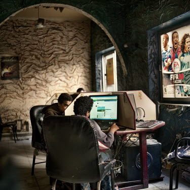 Young men using computers in a cybercafe called Space.net. The cafe was  being used by Khaled (Jaled) Said, a 28 year old blogger, when on 6 June 6 2010 he was dragged from inside its premises by two...