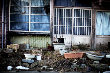 One of many abandoned houses in the village of Iitate. Most houses and shops have been abandoned by their owners following the tsunami and subsequent accident at the Fukushima nuclear power plant near...