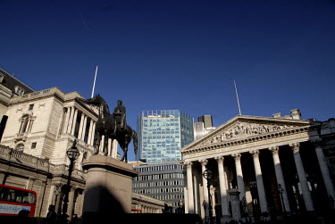 A view of the Old London Stock Exchange with a statue of the Duke of Wellington in front in the City of London. The Bank of England stands to the left.