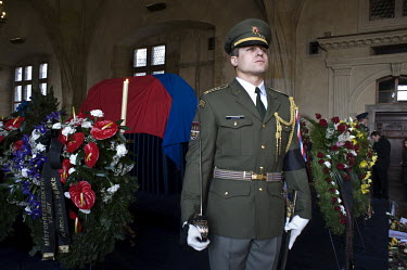A soldier stands guard in front of the coffin of Vaclav Havel in the Vladislave Hall of Prague Castle. Havel was a playwright, essayist and poet who became active as a dissident after the Soviet Invas...