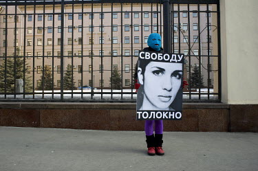 A supporters of the Russian female punk band Pussy Riot picket the Moscow Police headquarters to protest against the arrest of 2 of the group's members during anti Putin demonstrations. The band is kn...