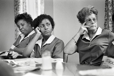 Newly contracted-out domestic workers at a lunchtime union meeting at St Charles Hospital, Notting Hill, London. The company they were employed by, Mediclean, had recently been awarded the cleaning co...