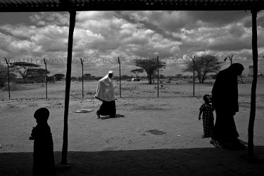 Somalian women and children waiting to enter the Dadaab refugee camp. The camp is the largest refugee complex in the world, originally set up at the start of Somalia's civil war in 1991 to accommodate...