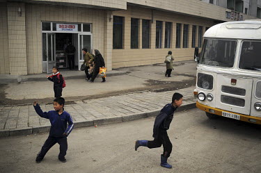 Children playing in the road in central Pyongyang.