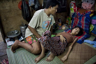 29 year old Ma Thandar, who has contracted HIV/AIDS, is cared for by her husband Ko Nyan Tun in a hospice for patients awaiting anti-retroviral drugs (ARVs) in Yangon. Ma Thandar died a few weeks afte...