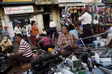 Used electrical equipment is sold at a market in Yangon.